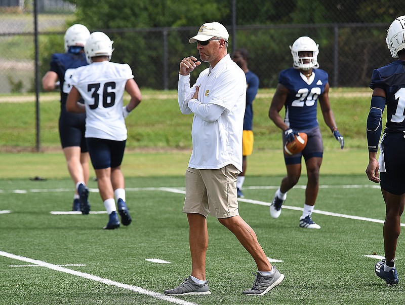 Staff photo by Matt Hamilton / UTC football coach Rusty Wright watches practice on Aug. 4 at Scrappy Moore Field. After a 2020-21 schedule that was anything but normal, the Mocs are preparing for the 2021 season, which opens Sept. 2 against Austin Peay at Finley Stadium.