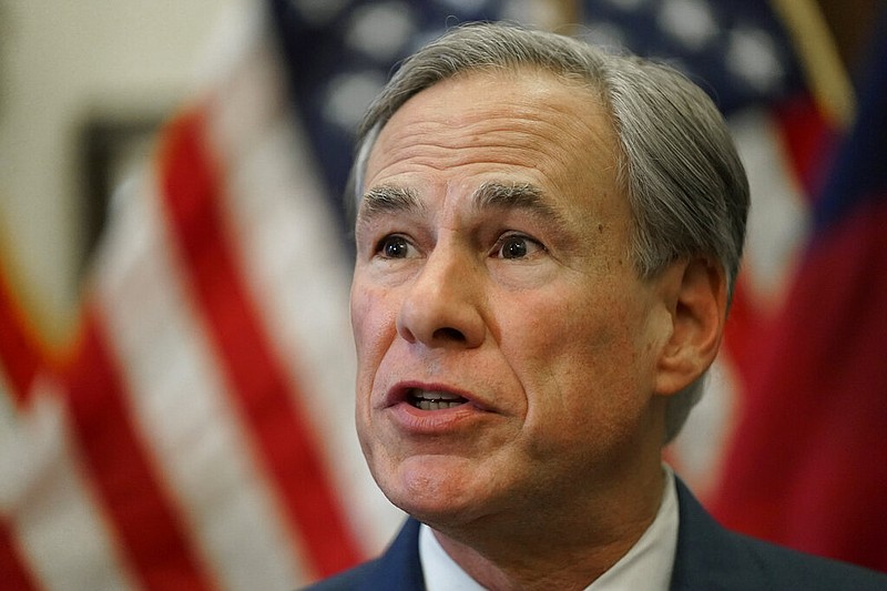 In this June 8, 2021, file photo, Texas Gov. Greg Abbott speaks at a news conference in Austin, Texas. Texas Democrats are starting a second week of holing up in Washington to block new voting laws back home. A reality is fast creeping in: the difficulty of sustaining attention and pressure on Congress with 17 days still left to run out the clock on a sweeping elections bill in Texas, which Abbott says he will keep reviving for as long as it takes. (AP Photo/Eric Gay, File)