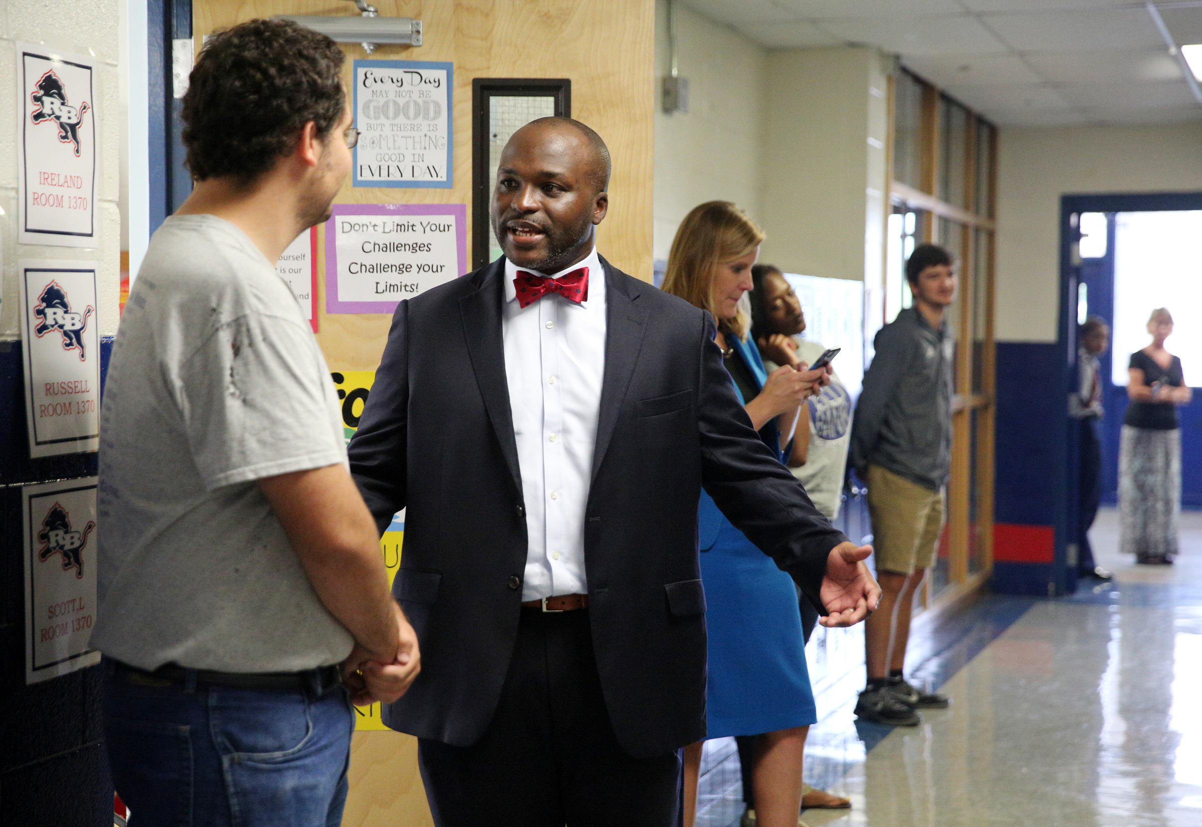 Tanner Swoyer, band captain, speaks with new Hamilton County Schools superintendent Bryan Johnson Thursday, Aug. 10, 2017, at Red Bank High School in Red Bank, Tenn. Swoyer was one of several students selected to welcome Johnson to the school for a tour.