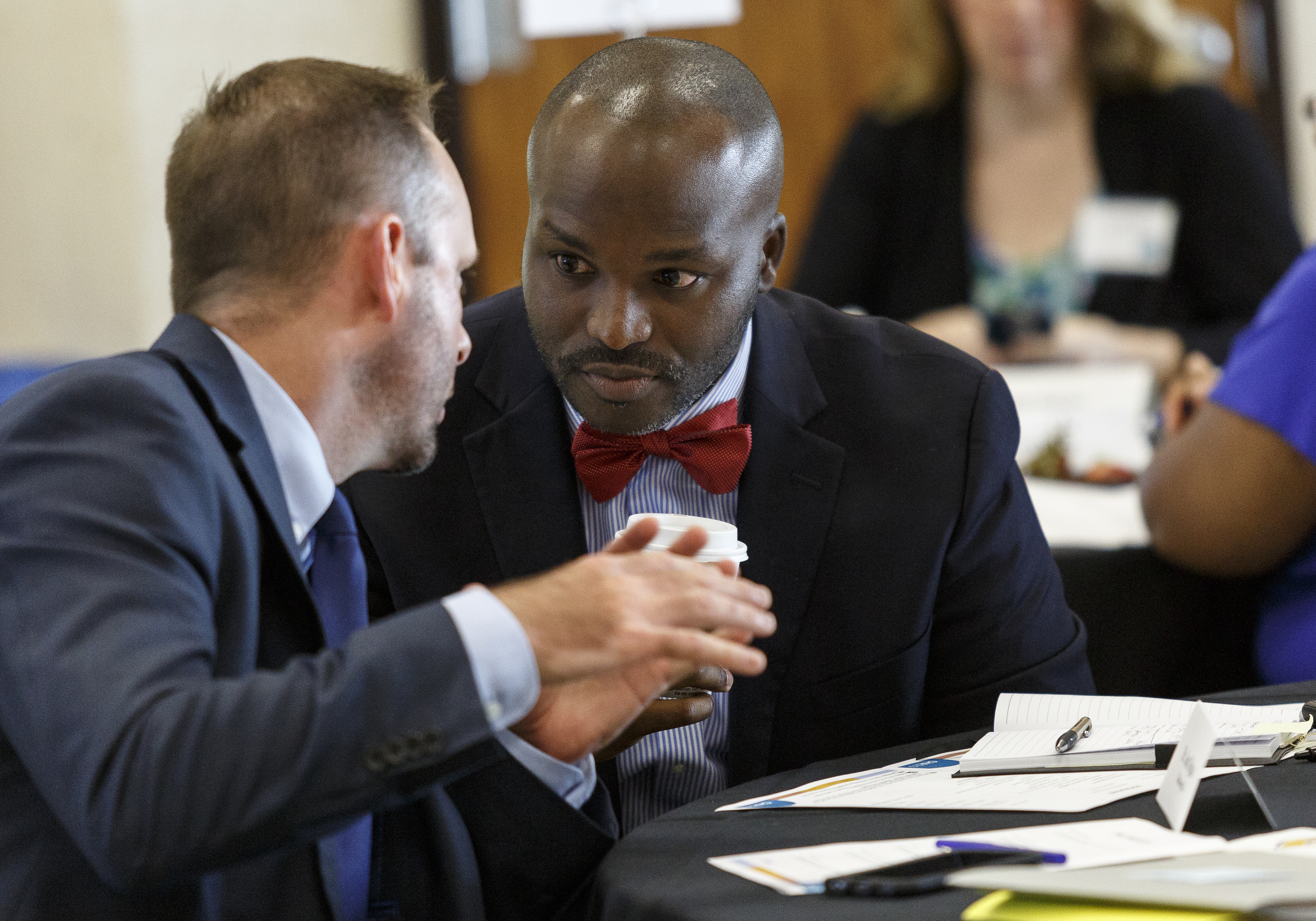 New Hamilton County Schools Superintendent Dr. Bryan Johnson, right, talks with Chattanooga 2.0's Dr. Jared Bigham during an update on the Chattanooga 2.0 initiative on the campus of the University of Tennessee at Chattanooga on Thursday, July 13, 2017, in Chattanooga, Tenn. Chattanooga 2.0 launched a year ago with the goal of improving education outcomes in Hamilton County.