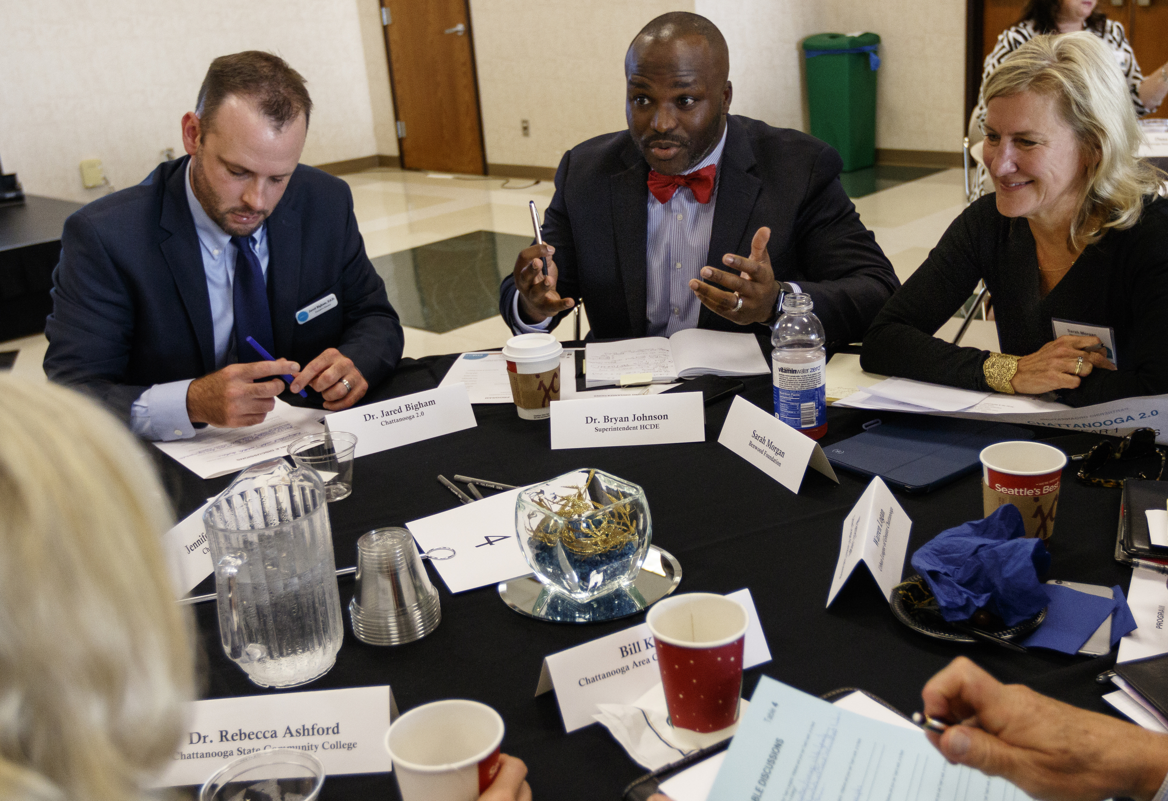 Dr. Jared Bigham with Chattanooga 2.0, left, new Hamilton County Schools Superintendent Dr. Bryan Johnson, center, and Sarah Morgan with the Benwood foundation talk in a group session during an update on the Chattanooga 2.0 initiative on the campus of the University of Tennessee at Chattanooga on Thursday, July 13, 2017, in Chattanooga, Tenn. Chattanooga 2.0 launched a year ago with the goal of improving education outcomes in Hamilton County.