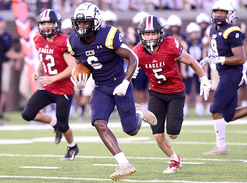 Staff photo by Robin Rudd / Chattanooga Christian's Boo Carter (6) breaks free for his second touchdown against Signal Mountain during the Best of Preps Jamboree on Aug. 12 at Finley Stadium. Carter is one reason the Chargers could be region and state contenders this season despite having to count on lots of young players.