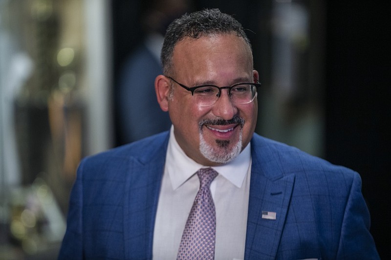 Education Secretary Miguel Cardona speaks to press after a visit to P.S. 5 Port Morris, a Bronx elementary school, Tuesday, Aug. 17, 2021 in New York. (AP Photo/Brittainy Newman)

