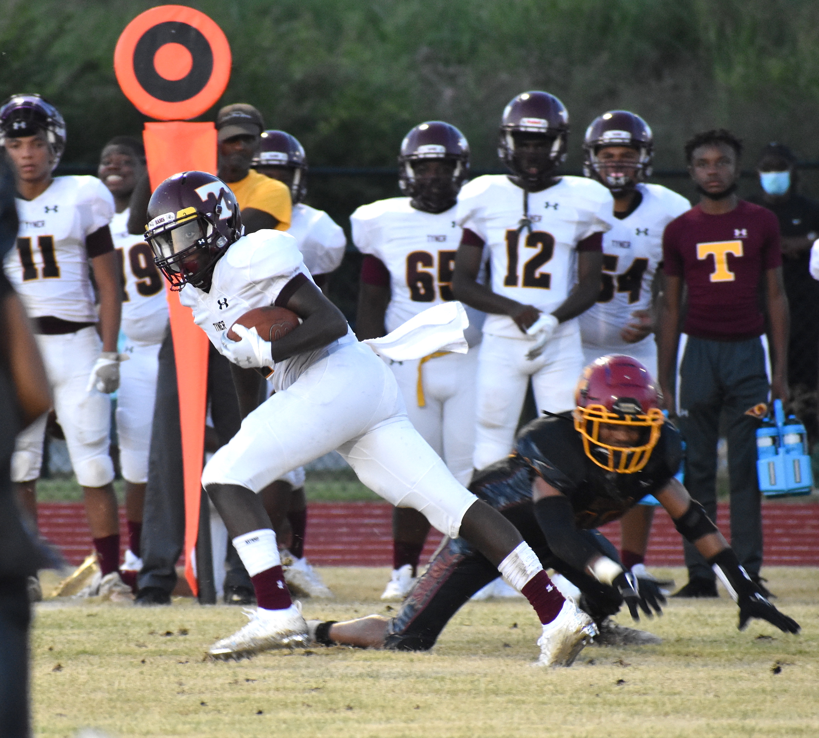 Staff photo by Patrick MacCoon / Tyner's Nigel Twitty makes a defender miss during Friday's season opening road victory over Howard.