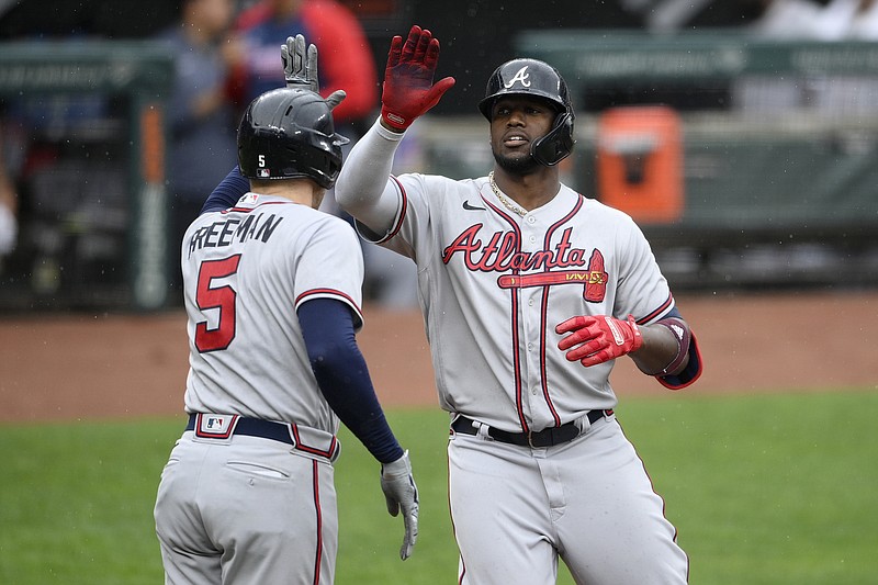 AP photo by Nick Wass / Atlanta Braves designated hitter Jorge Soler, right, celebrates his home run with first baseman Freddie Freeman during the fourth inning of Sunday's game against the host Baltimore Orioles.