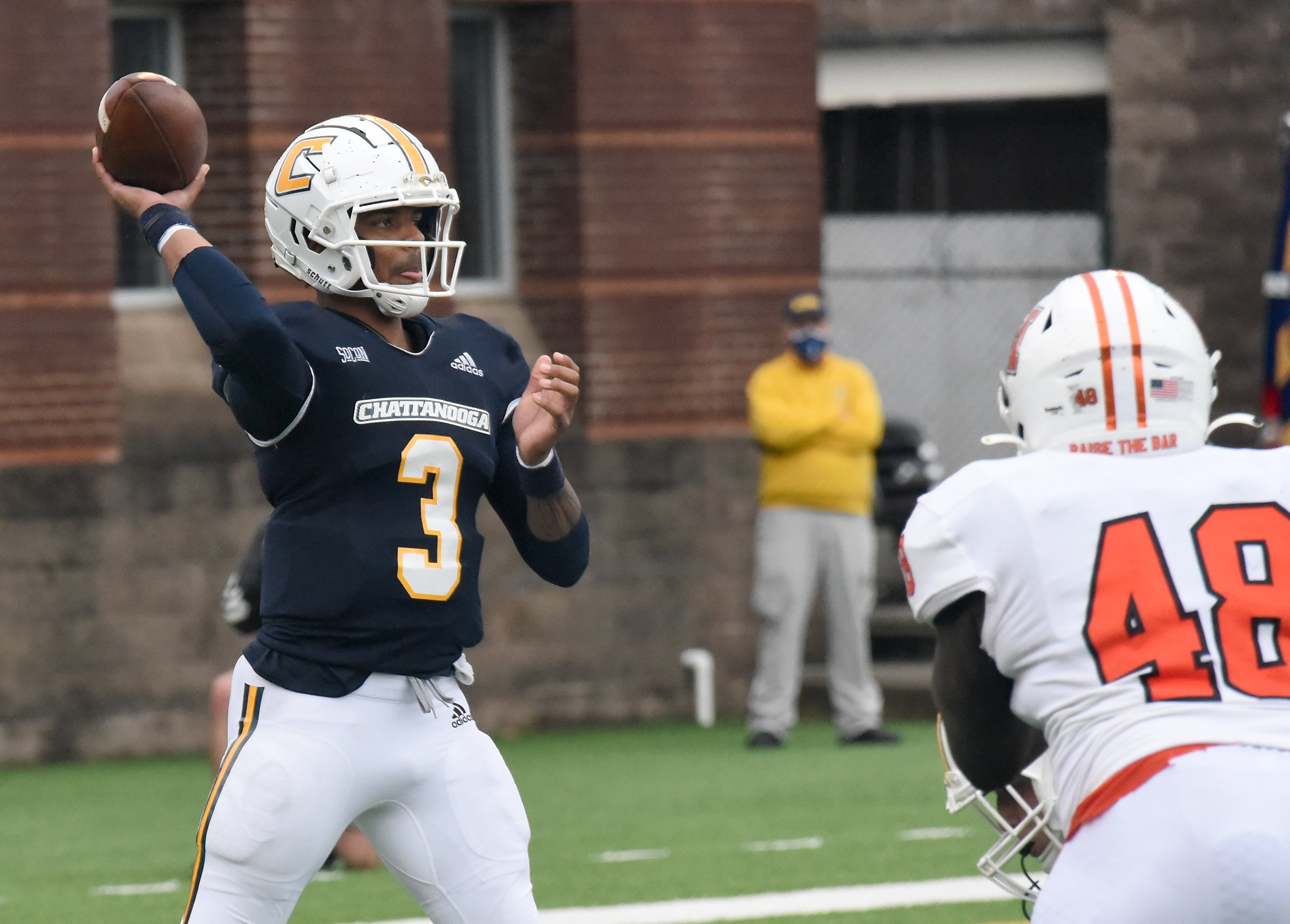 Staff Photo by Matt Hamilton / UTC (3) Drayton Arnold tosses a pass over the middle at Finley Stadium in Chattanooga on Saturday, March 27, 2021.
