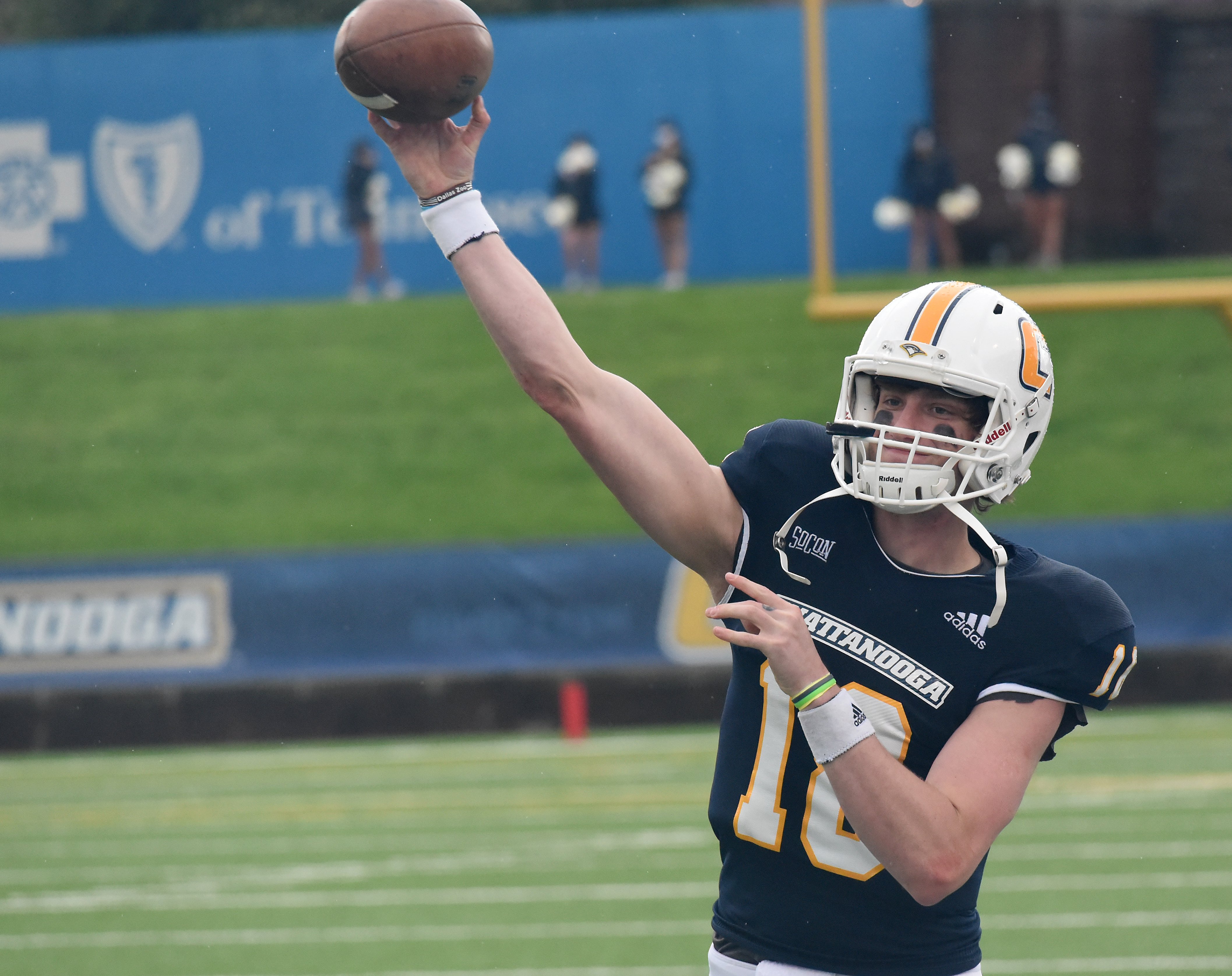 Staff Photo by Matt Hamilton / UTC (18) Cole Copeland keeps his arm warm during a timeout at Finley Stadium in Chattanooga on Saturday, March 27, 2021.