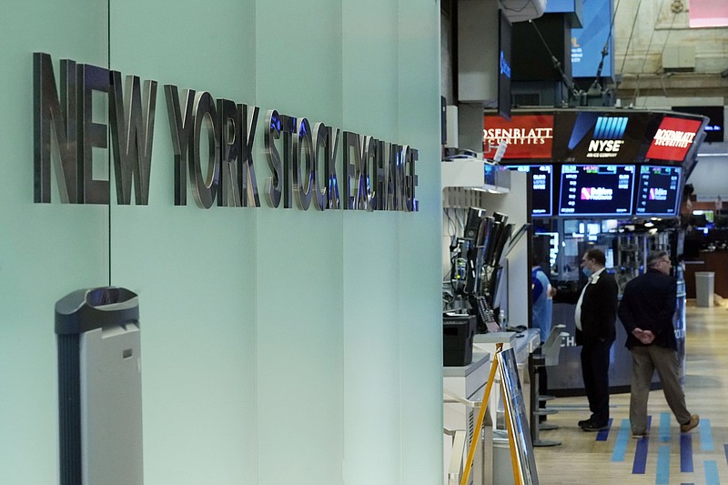 FILE - Traders work on the floor of the New York Stock Exchange, Monday, July 19, 2021. Stocks are off to a mixed start on Wall Street as big tech companies gain while health care and other sectors fall. The S&P 500 was little changed in the early going Wednesday, Aug. 25, 2021 a day after setting its 50th record high for the year. (AP Photo/Richard Drew, file)