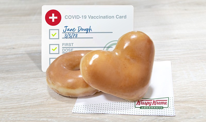 Photo Courtesy of Krispy Kreme / Krispy Kreme will give away a second, heart-shaped doughnut, along with an Original Glazed, to any customer showing proof of a COVID-19 vaccine from Monday, Aug. 30, to Sunday, Sept. 5.