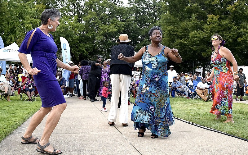 Staff Photo by Robin Rudd/  People began to dance to the tunes of "Peace, Love and Happiness."  The Big 9 Roots Festival was hosted by the Bessie Smith Cultural Center and the Mary Walker Historical and Education Foundation.  The event which covered blocks of Martin Luther King Jr. Blvd happened on October 5, 2019.  