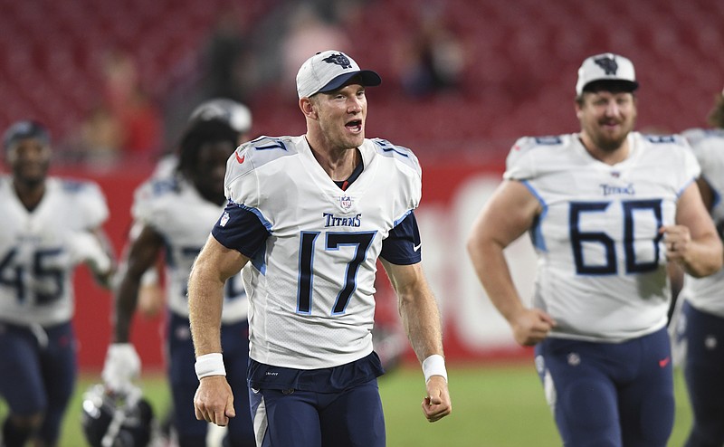 AP photo by Jason Behnken / Tennessee Titans quarterback Ryan Tannehill (17), shown during the second half of Saturday night's preseason game against the host Tampa Bay Buccaneers, is one of seven players on the team now on the NFL's COVID-19 reserve list.