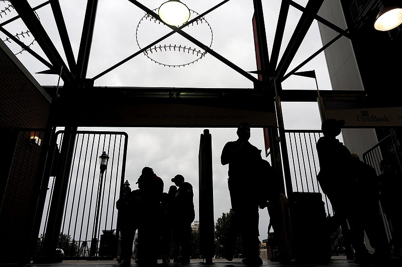 Staff photo / Fans enter AT&T Field on May 4, when the Chattanooga Lookouts were scheduled to open their Double-A South season against the Rocket City Trash Pandas before inclement weather postponed the game.