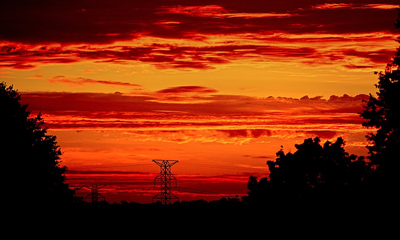 Staff Photo by Robin Rudd / It appears the ancient rhyme, "Red sky at morning, sailor take warning," holds some validty for the Chattanooga area, as seen in this photo from Monday's dawn in East Brainerd. WRCB Weather forecast says to, expect 2-4" of rainfall through Wednesday morning, most of which will fall today (Tuesday). The heaviest rain from Ida will be west of I-75, including Chattanooga. Most of our counties are under a Flash Flood Watch for Tuesday into Wednesday." Accordind to Wikipedia the ancient rhyme is even mentioned in the New Testament.
