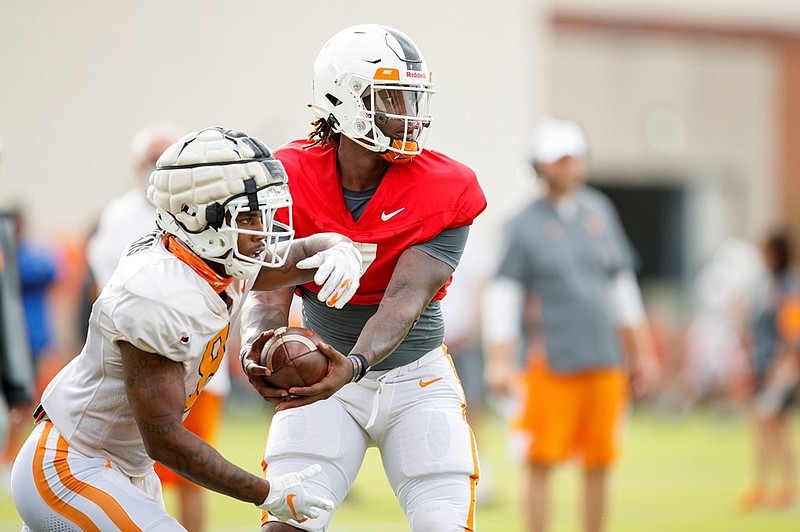 Tennessee Athletics photo / Tennessee quarterback Joe Milton, shown here with running back Tiyon Evans during a recent practice, was named Monday as the starter for Thursday night's opener against Bowling Green.