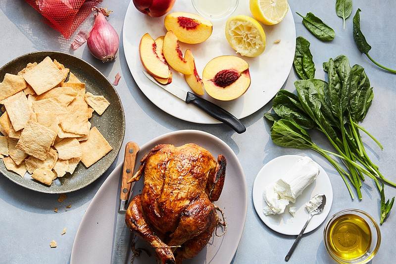Rotisserie chicken anchors a dinner spread prepared without cooking. You can leave the oven behind. For a meal that's as satisfying as one that you've spent all day cooking, focus on smart shopping and artful assembly. / Photo by Linda Xiao/The New York Times