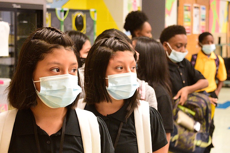 Staff file photo by Robin Rudd / Students in Melanie Raybon's Sixth Grade class wear masks as they ready to head to class at Orchard Knob Middle School on Aug. 9, before Tennessee Gov. Bill Lee forced school districts to give parents "opt-outs" from the masking requirement.