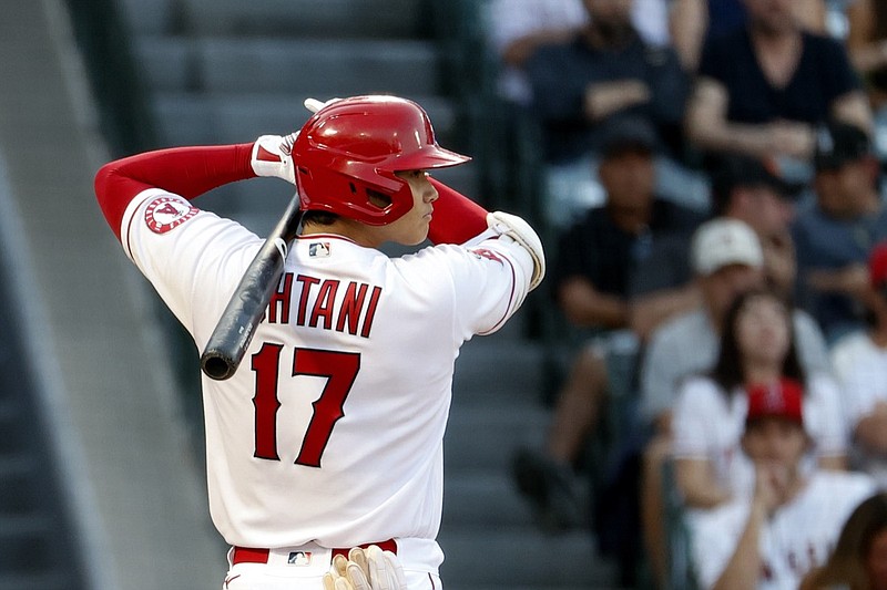 Los Angeles Angels' Shohei Ohtani prepares to swing a pitch against the New York Yankees during the first inning of a baseball game in Anaheim, Calif., Monday, Aug. 30, 2021. (AP Photo/Ringo H.W. Chiu)