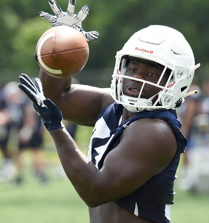 Staff photo by Matt Hamilton / UTC running back Ailym Ford catches a pass during practice early this month. Ford is part of a deep group of running backs and one reason the Mocs should be optimistic about their chances for SoCon and national success this season.