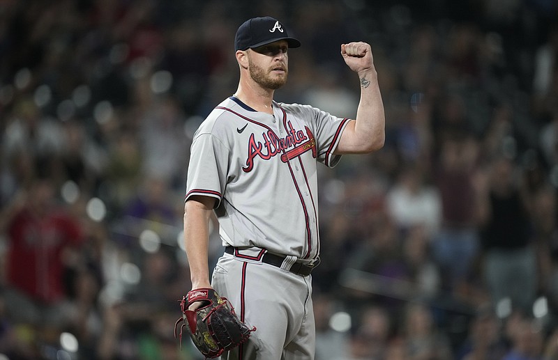 AP photo by David Zalubowski / Atlanta Braves relief pitcher Will Smith reacts after getting Colorado Rockies pinch-hitter Garrett Hampson to ground into a double play to end Thursday night's game in Denver.