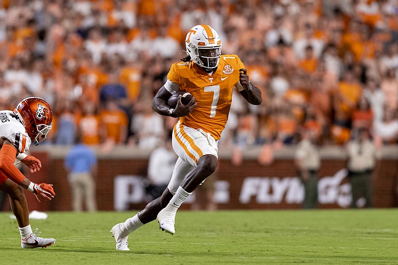 Tennessee Athletics photo by Andrew Ferguson / Tennessee quarterback Joe Milton looks for running room during Thursday night's 38-6 win over Bowling Green in Neyland Stadium.