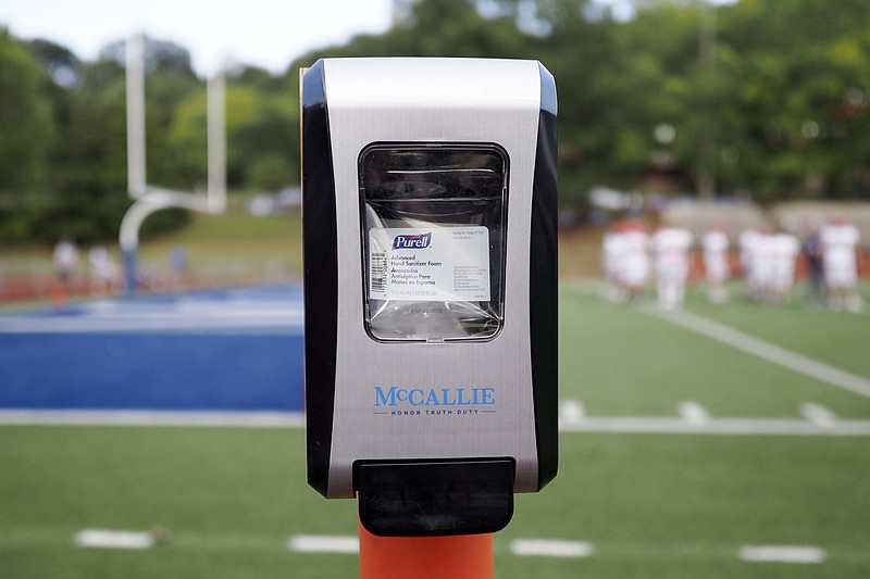 Staff photo by C.B. Schmelter / A hand sanitizer dispenser is seen on the field at Spears Stadium on the campus of McCallie School on Friday, Sept. 4, 2020 in Chattanooga, Tenn.