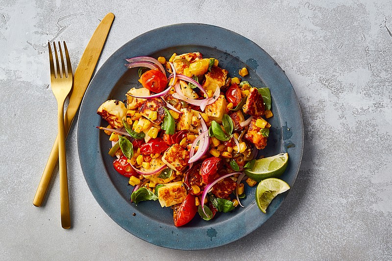 A meal of Halloumi With Corn, Cherry Tomatoes and Basil comes together in under 30 minutes. / Photo by Bryan Gardner/The New York Times