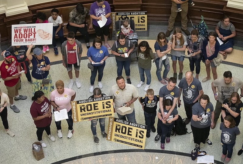 FILE - In this March 30, 2021, file photo, pro-life demonstrators gather in the rotunda at the Capitol while the Senate debated anti-abortion bills in Austin, Texas. (Jay Janner/Austin American-Statesman via AP, File)


