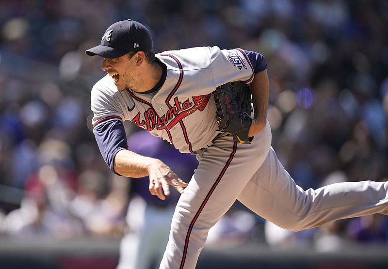 AP photo by David Zalubowski / Atlanta Braves starter Charlie Morton pitches during the sixth inning of Sunday's game against the Colorado Rockies in Denver. Morton allowed two runs, two hits and two walks while striking out three batters in seven innings, and the Braves won 9-2 to split a four-game series in Colorado.