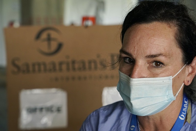 Kelly Sites, a nurse and team leader with the Samaritan's Purse International Relief medical team in Jackson, Miss., speaks of the group's medical missions and how it has affected her, Wednesday, Aug. 25, 2021. Sites has been deployed 22 medical missions with the nondenominational evangelical Christian organization that provides spiritual and medical aid internationally and domestically. (AP Photo/Rogelio V. Solis)