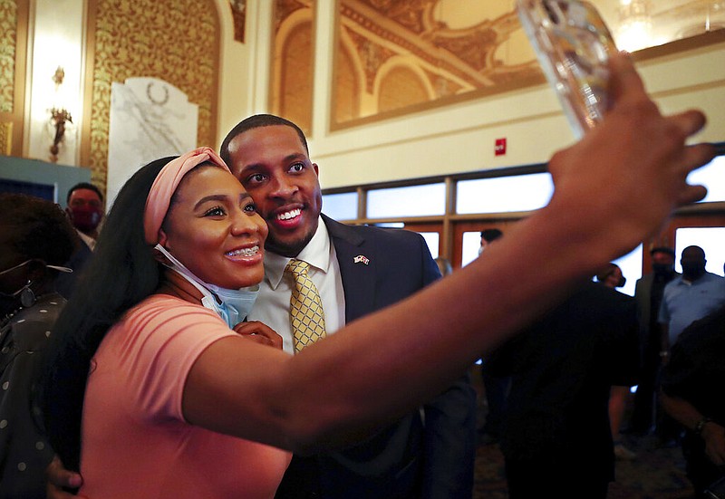 Memphis City Council member JB Smiley Jr. takes a selfie with a member of the audience after an event announcing his bid for governor of Tennessee at the Orpheum Theatre in Memphis, Tenn., on Wednesday, Sept. 8, 2021. (Patrick Lantrip/Daily Memphian via AP)