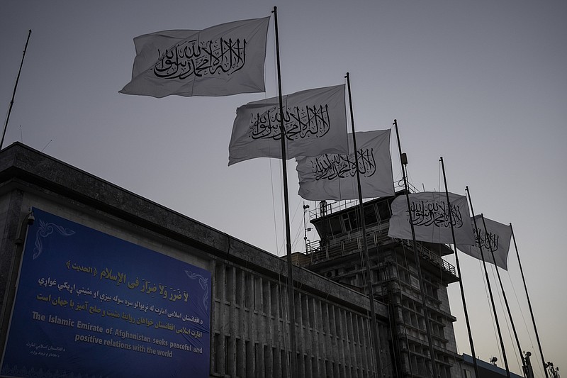 AP Photo/Bernat Armangue / Taliban flags flutter at the airport in Kabul, Afghanistan, on Thursday, Sept. 9, 2021.