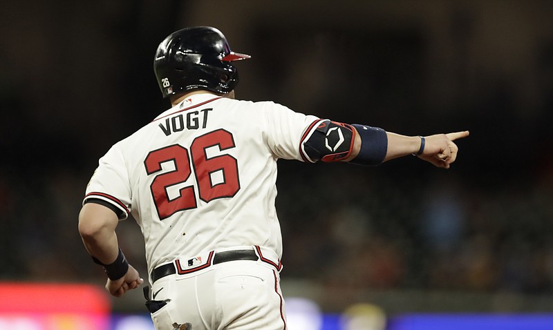 AP photo by Ben Margot / Atlanta Braves catcher Stephen Vogt celebrates after hitting a home run off the Washington Nationals' Erick Fedde during the fifth inning of Thursday night's game in Atlanta. Vogt homered twice, and the Braves won 7-6 in 10 innings.