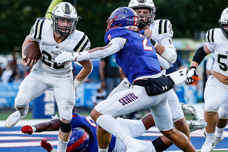 Staff photo by Troy Stolt / Bradley Central running back Jackson Wilson, left, shown during the team's Sept. 3 win at Cleveland, continued an impressive start to the season Friday night, when the Bears visited McMinn County.