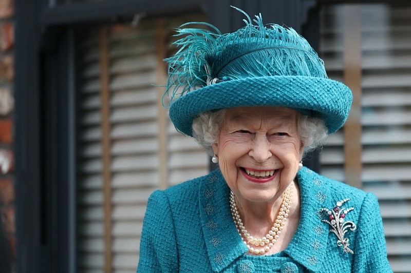 FILE - In this Thursday July 8, 2021 file photo, Britain's Queen Elizabeth visits the set of the long running television series Coronation Street, in Manchester, England. (AP Photo/Scott Heppell, file)


