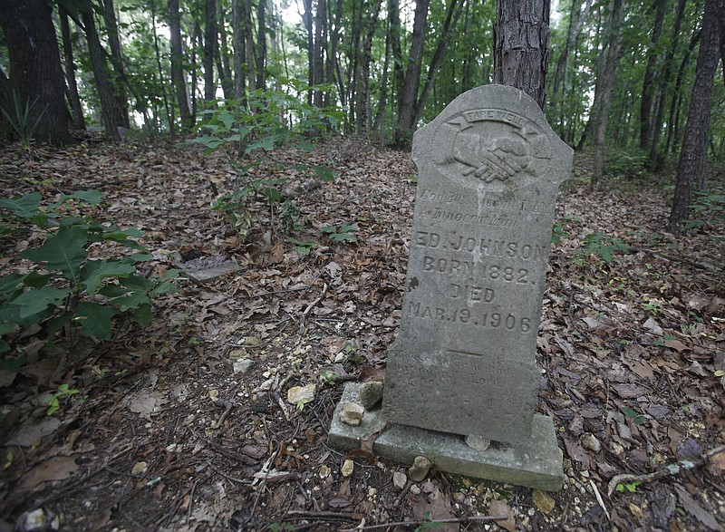 Staff File Photo / Pictured is the headstone of Ed Johnson, who was lynched on the Walnut Street Bridge in 1906, on Tuesday, May 29, 2012, at Pleasant Gardens Cemetery in Chattanooga.