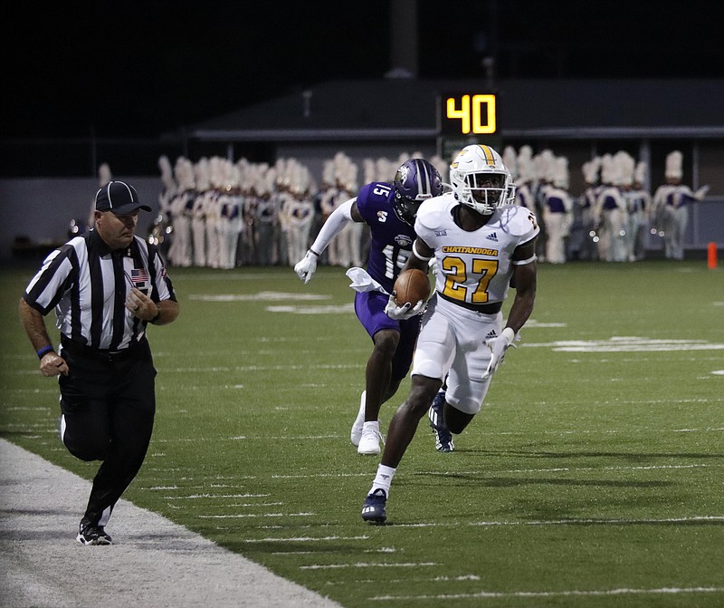 GoMocs.com photo by Logan Stapleton / UTC's Jerrell Lawson looks for room to run after intercepting a pass during Saturday's game at North Alabama. Lawson scored on the play and the Mocs won 20-0 to even their record at 1-1.