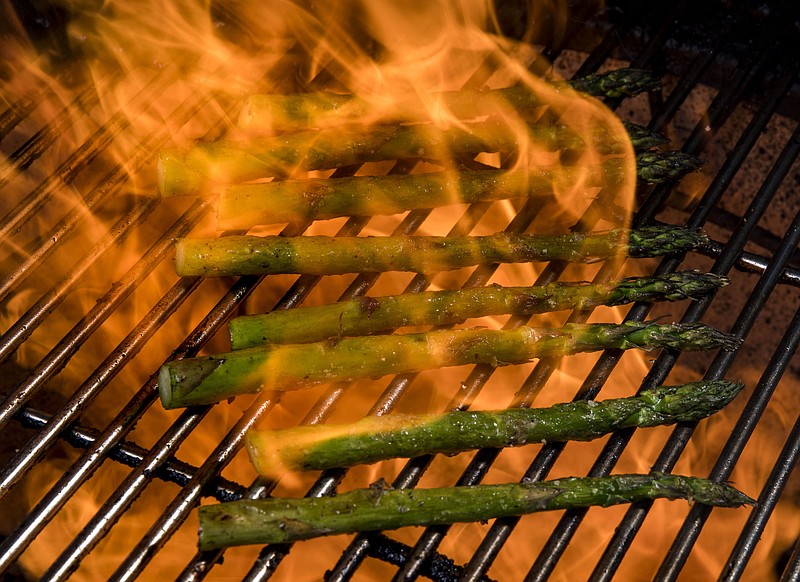 Grill asparagus spears until the skin is shriveled and slightly charred all over. / Photo by Colter Peterson/St. Louis Post-Dispatch/TNS