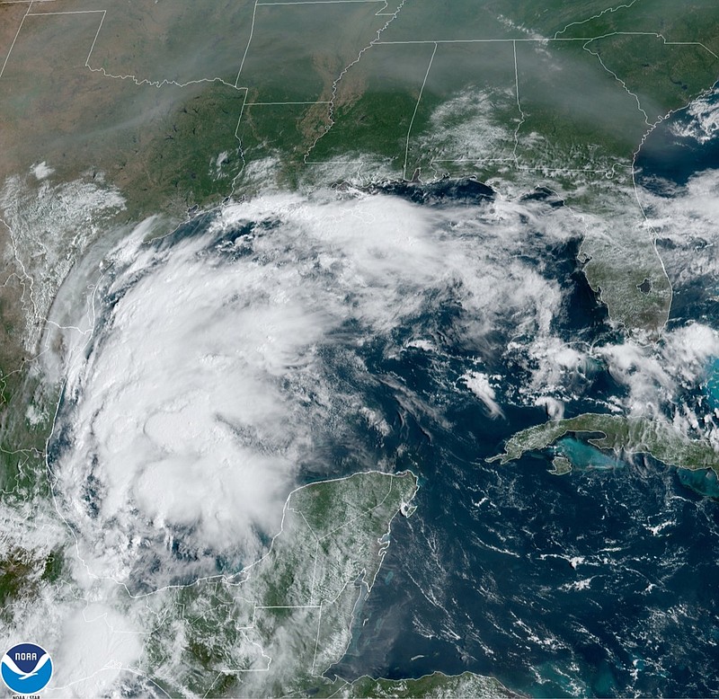 This satellite image provided by NOAA shows Tropical Storm Nicholas in the Gulf of Mexico on Sunday, Sept. 12, 2021. Tropical storm warnings have been issued for coastal Texas and the northeast coast of Mexico. Nicholas is expected to produce storm total rainfall of 5 to 10 inches, with isolated maximum amounts of 15 inches, across portions of coastal Texas into southwest Louisiana Sunday, Sept. 12 through midweek. (NOAA via AP)