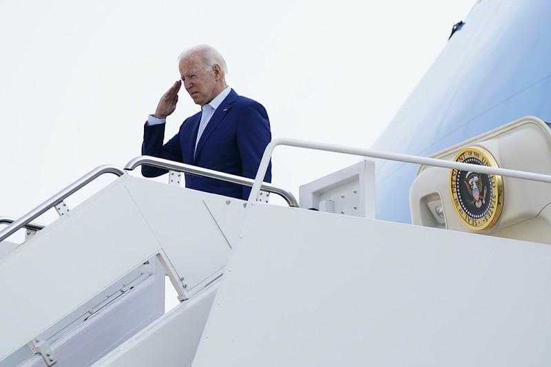 President Joe Biden salutes before boarding Air Force One for a trip to visit the National Interagency Fire Center in Boise, Idaho, Monday, Sept. 13, 2021, in Andrews Air Force Base, Md. (AP Photo/Evan Vucci)

