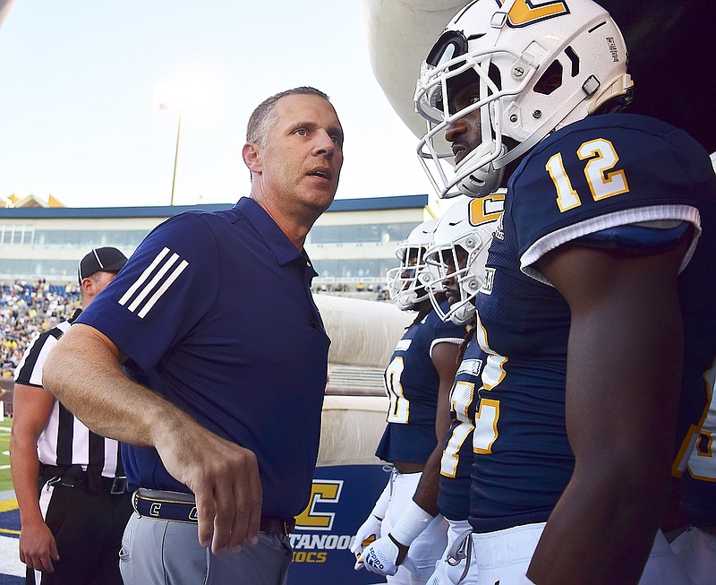 Staff Photo by Robin Rudd / UTC head coach Rusty Wright talks to his Mocs before they take the field.  The University of Tennessee at Chattanooga Mocs hosted the Austin Peay State University Governors, at Finley Stadium, in the season-opener for both team on September 2, 2021
