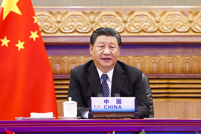 Photo by Huang Jingwen/Xinhua via The Associated Press / In this photo released by Xinhua News Agency, Chinese President Xi Jinping attends the 13th BRICS summit via video link in Beijing, China on Sept. 9, 2021.