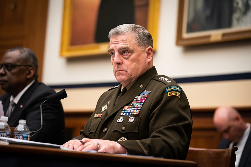 Photo by Sarahbeth Maney of The New York Times / United States Army Gen. Mark Milley, chairman of the Joint Chiefs of Staff, participates in a hearing of the House Committee on Armed Services on Capitol Hill in Washington on Wednesday, June 23, 2021. Milley twice called his Chinese counterpart in the final months of the Trump administration to reassure him that Trump had no plans to attack China in an effort to remain in power and that the United States was not collapsing, according to "Peril," a new book by the Washington Post reporters Bob Woodward and Robert Costa.