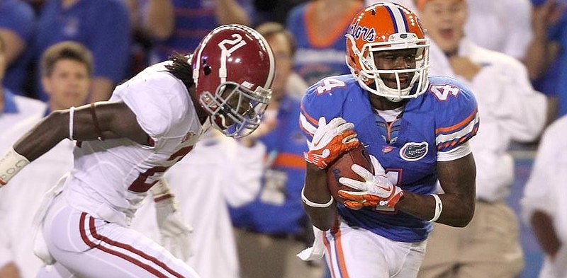 Florida Athletics photo / Florida receiver Andre Debose hauls in a 65-yard touchdown reception with Dre Kirkpatrick defending to give the Gators a 7-0 lead in their 2011 matchup. Alabama quickly regrouped and won 38-10 in what serves as the last Alabama-Florida game in the Swamp until this Saturday.