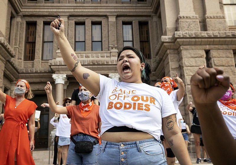 FILE - Leen Garza participates in a protest with others against the six-week abortion ban at the Capitol in Austin, Texas, on Wednesday, Sept. 1, 2021. (Jay Janner/Austin American-Statesman via AP, File)


