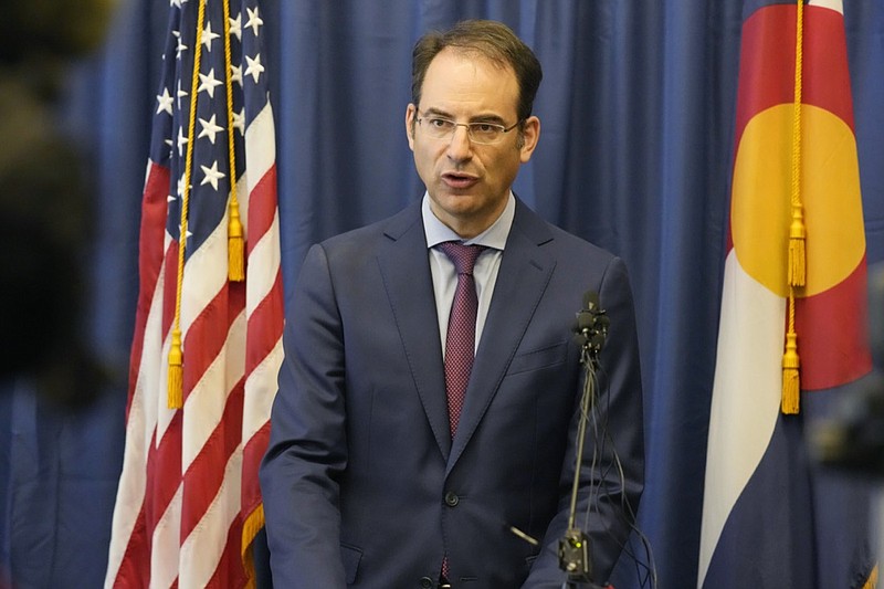 FILE - In this Sept. 1, 2021, file photo, Colorado Attorney General Phil Weiser talks about a grand jury investigation into the death of Elijah McClain, a Black man who was put in a chokehold by police and injected with a powerful sedative two years ago, during a news conference in Denver. Colorado's attorney general said Wednesday, Sept. 15, 2021, that a civil rights investigation begun amid outrage over the death of McClain has found that the Aurora Police Department has pattern of racially biased policing. (AP Photo/David Zalubowski, File)