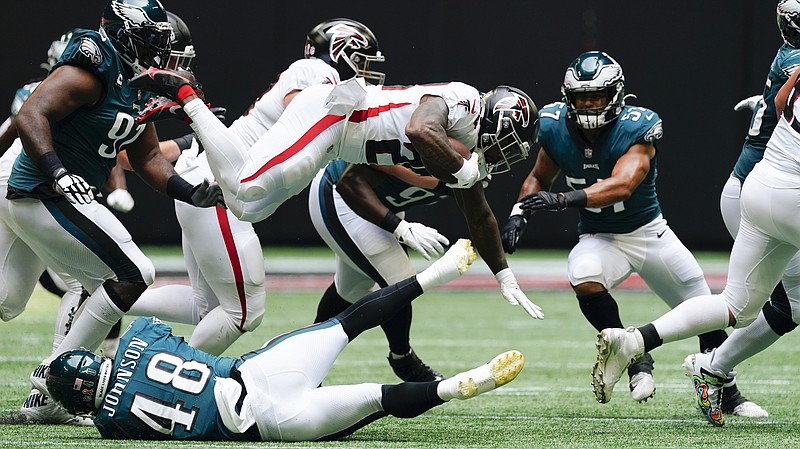 AP photo by John Bazemore / Atlanta Falcons running back Mike Davis leaps during Sunday's home game against the Philadelphia Eagles. Atlanta lost 32-6 in a dismal showing by their offense.