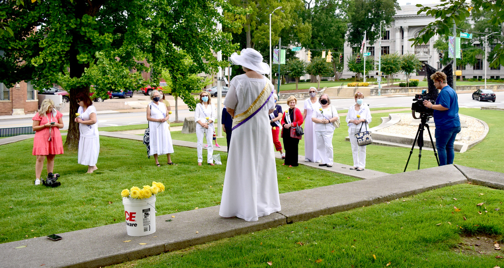 Staff Photo by Robin Rudd / Hamilton County Historian Linda Moss Mines portrays Abbe Crawford Milton at the ceremony. The League of Women Voters of Chattanooga held a dedication ceremony on Friday, Sept. 17, 2021, to celebrate suffragist Abby Crawford Milton's work across the state for passage of the 19th amendment, ultimately winning women the right to vote. The ceremony was held in Philips Park at the corner of McCallie and Georgia Avenues where Milton's historical marker stands. The celebration included the installation of a plaque and park bench donated by the league.