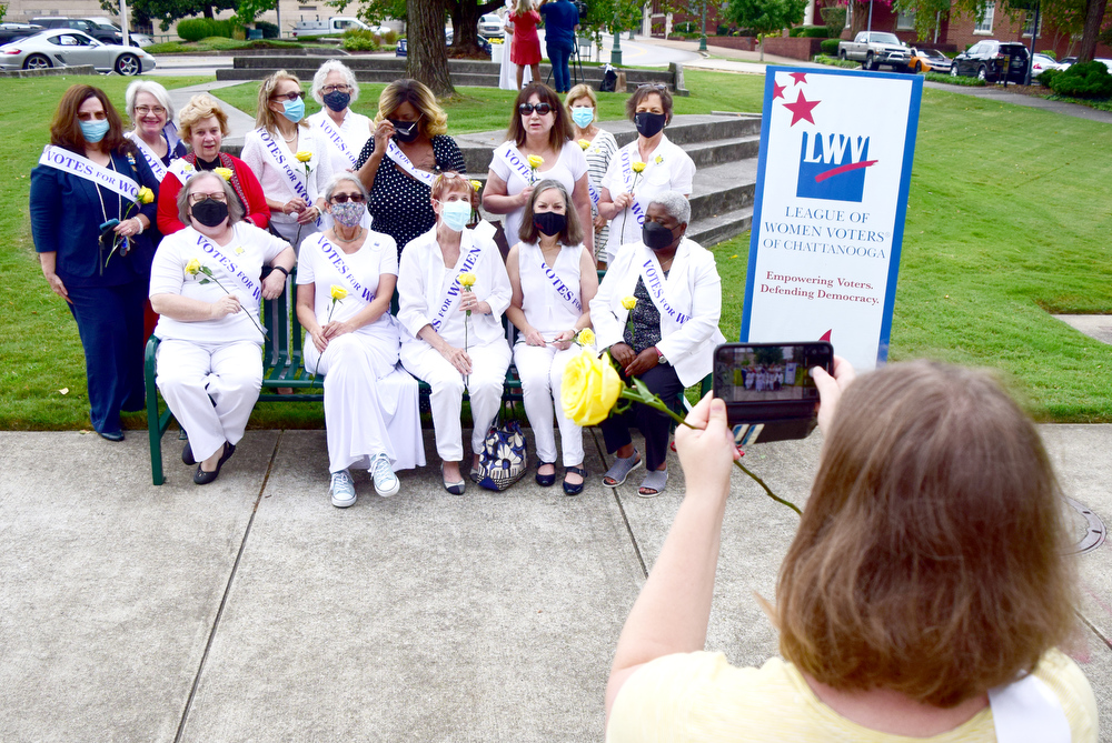 Staff Photo by Robin Rudd / Members of the League of Women Voters have their photo on the bench dedicated to Abby Crawford Milton. The League of Women Voters of Chattanooga held a dedication ceremony on Friday, Sept. 17, 2021, to celebrate suffragist Abby Crawford Milton's work across the state for passage of the 19th amendment, ultimately winning women the right to vote. The ceremony was held in Philips Park at the corner of McCallie and Georgia Avenues where Milton's historical marker stands. The celebration included the installation of a plaque and park bench donated by the league.