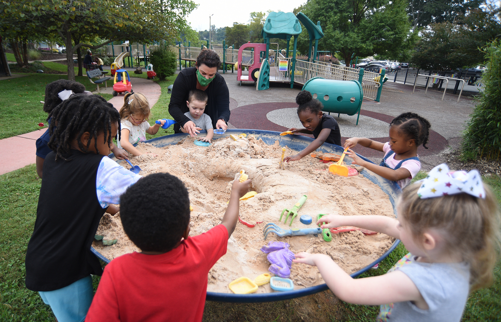 Staff Photo by Matt Hamilton / Children play with sand on Thursday, September 16, 2021 at Signal Centers. Friends of Special Children is holding a fundraiser for playground equipment for Signal Centers.