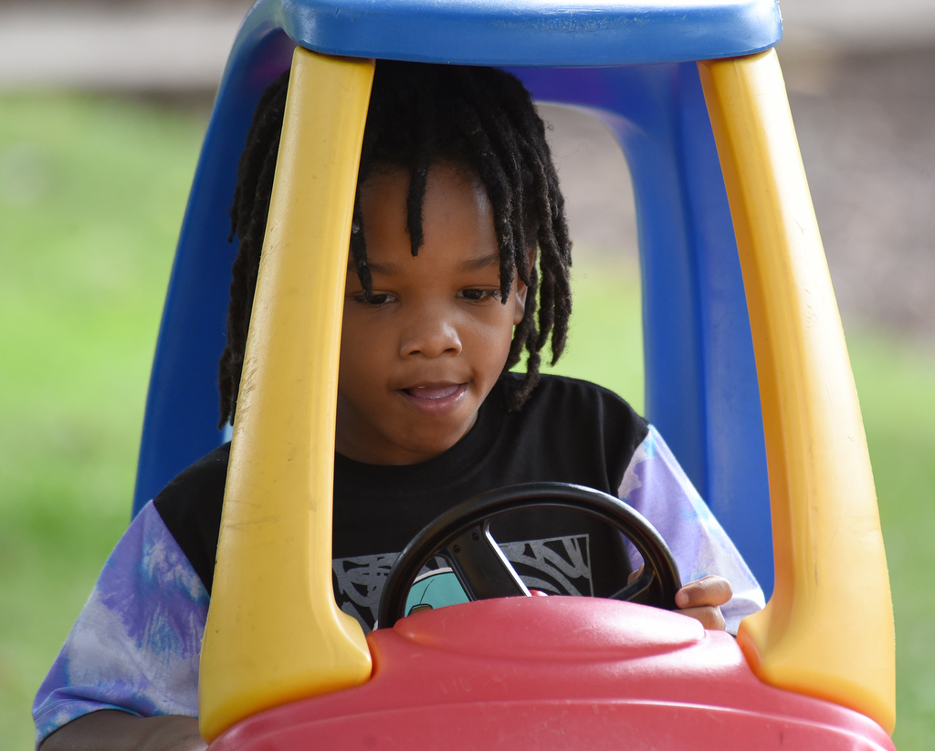 Staff Photo by Matt Hamilton / Darrien Boone, Jr. drives a toy car on Thursday, September 16, 2021 at Signal Centers. Friends of Special Children is holding a fundraiser for playground equipment for Signal Centers.